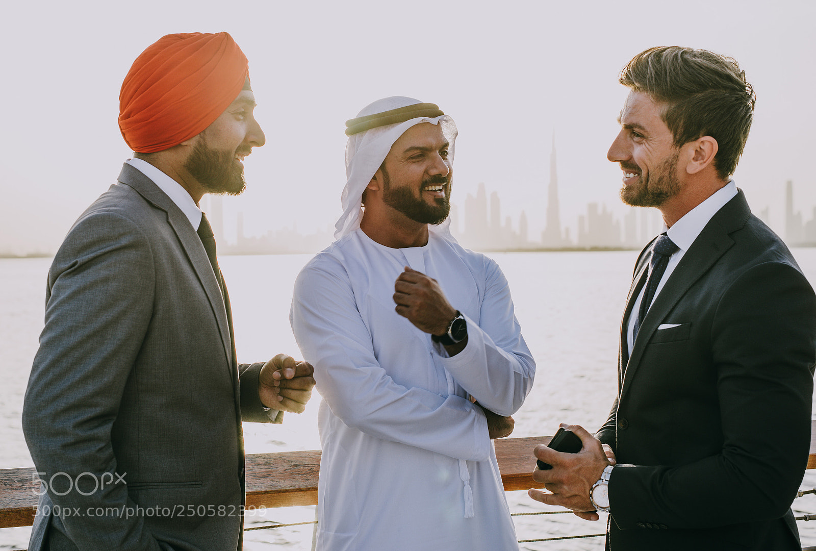 Nikon D610 sample photo. Business team talking about photography