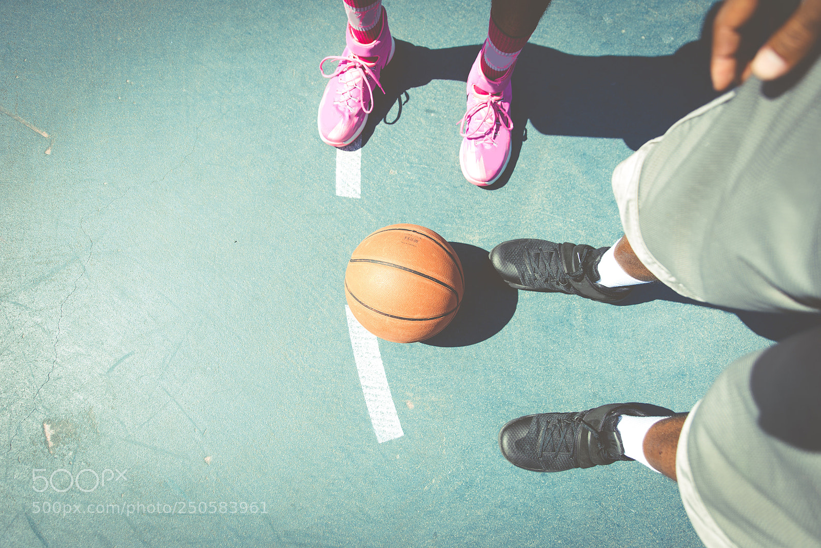 Nikon D610 sample photo. Two basketball players playing photography