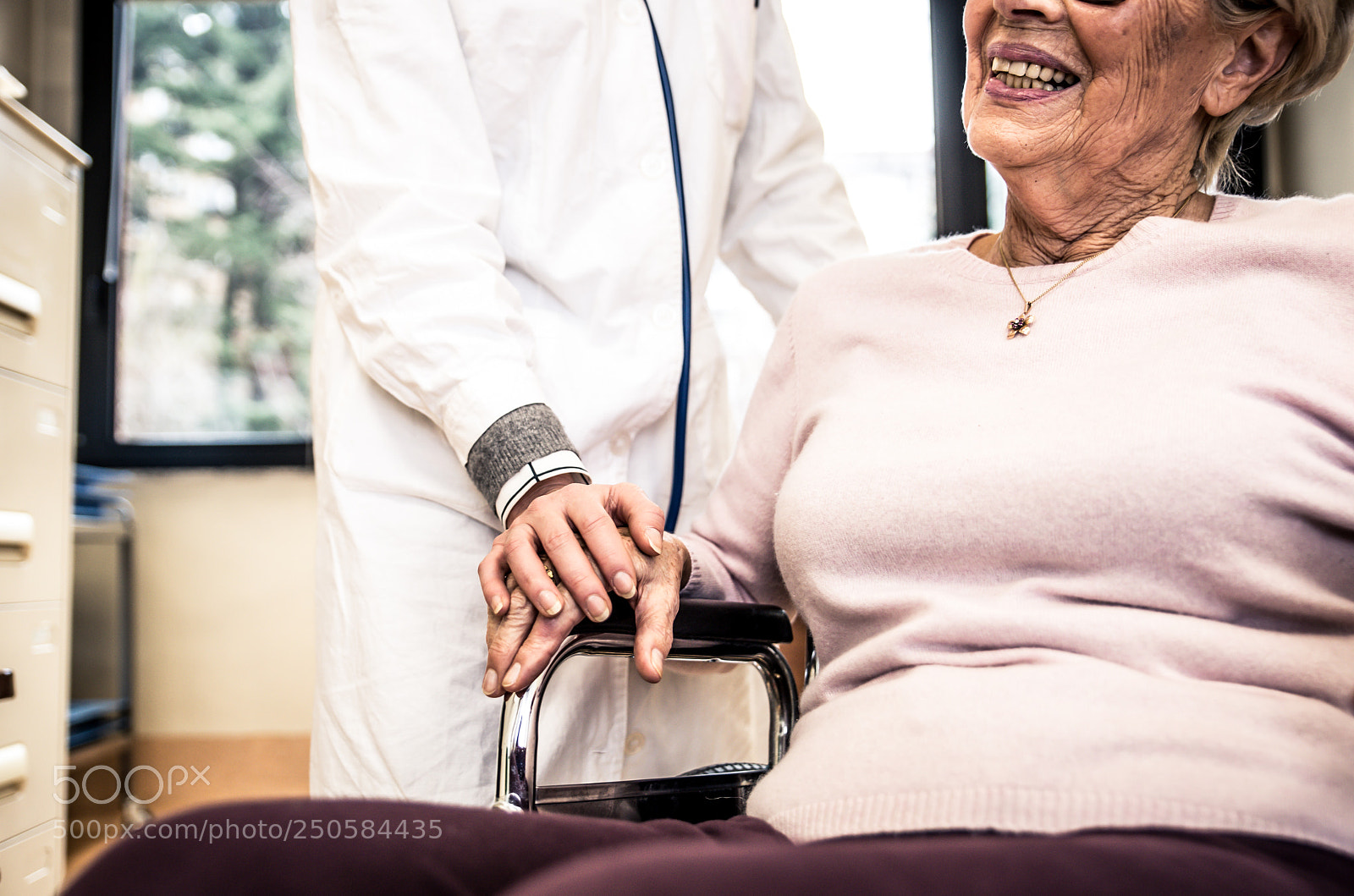 Nikon D610 sample photo. Nurse assisting patient in photography
