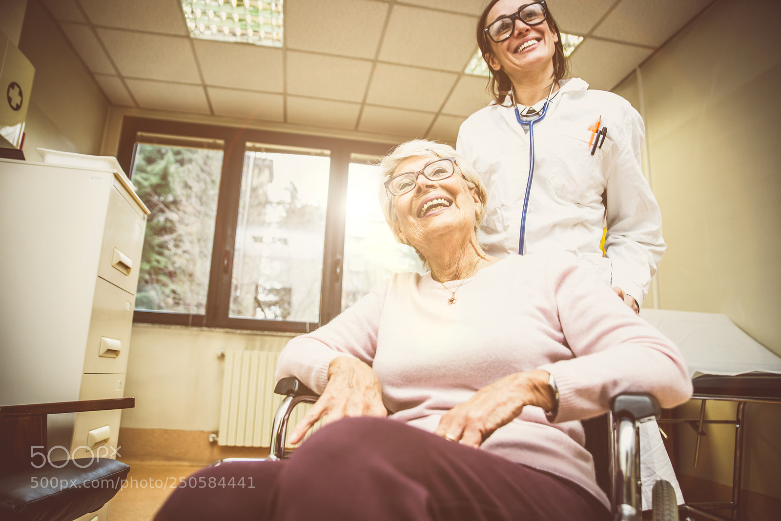 Nikon D610 sample photo. Nurse assisting patient in photography