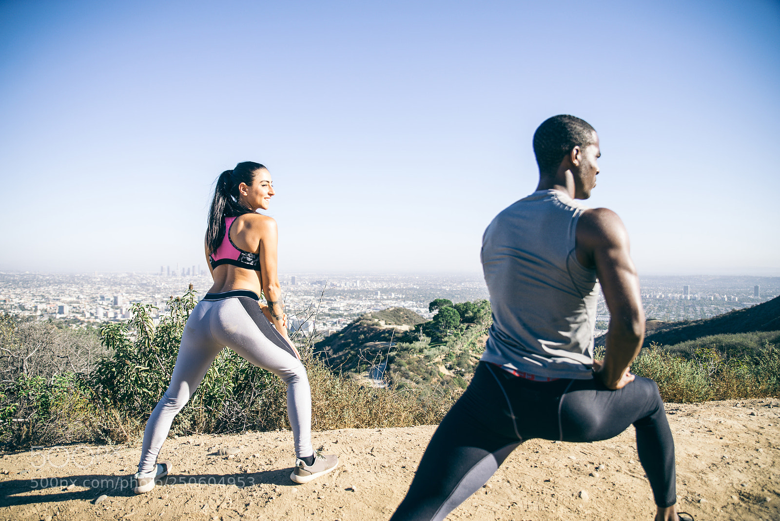 Nikon D610 sample photo. Runners doing stretching photography