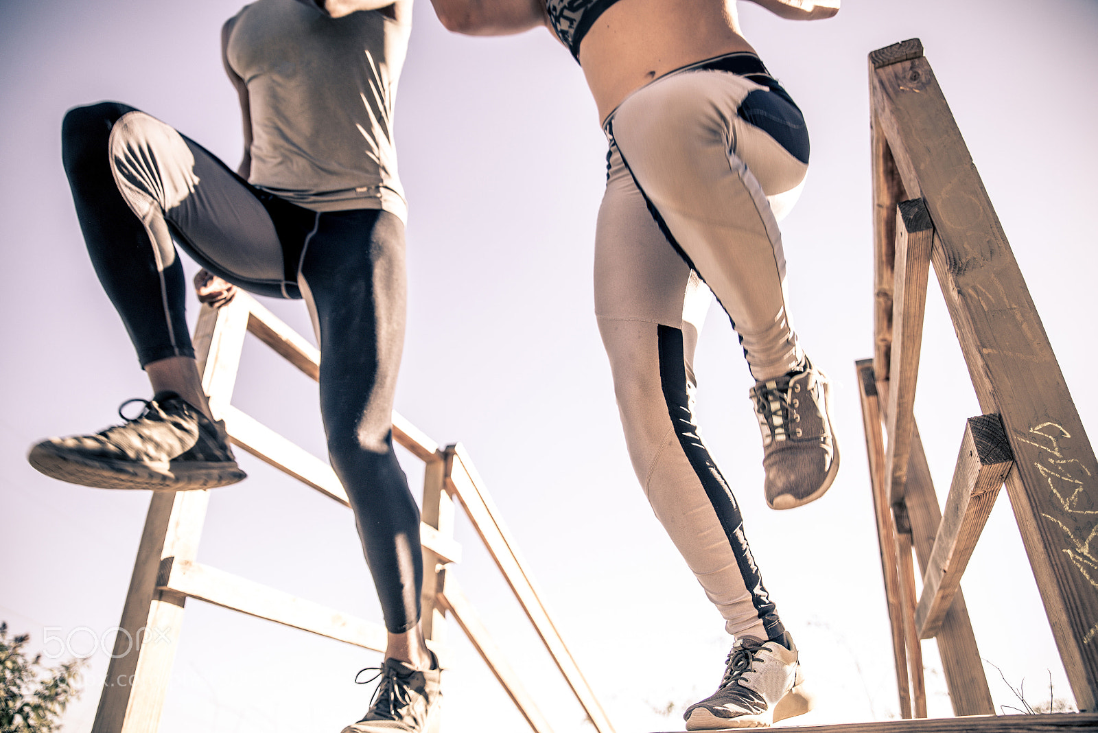 Nikon D610 sample photo. Runners jumping photography
