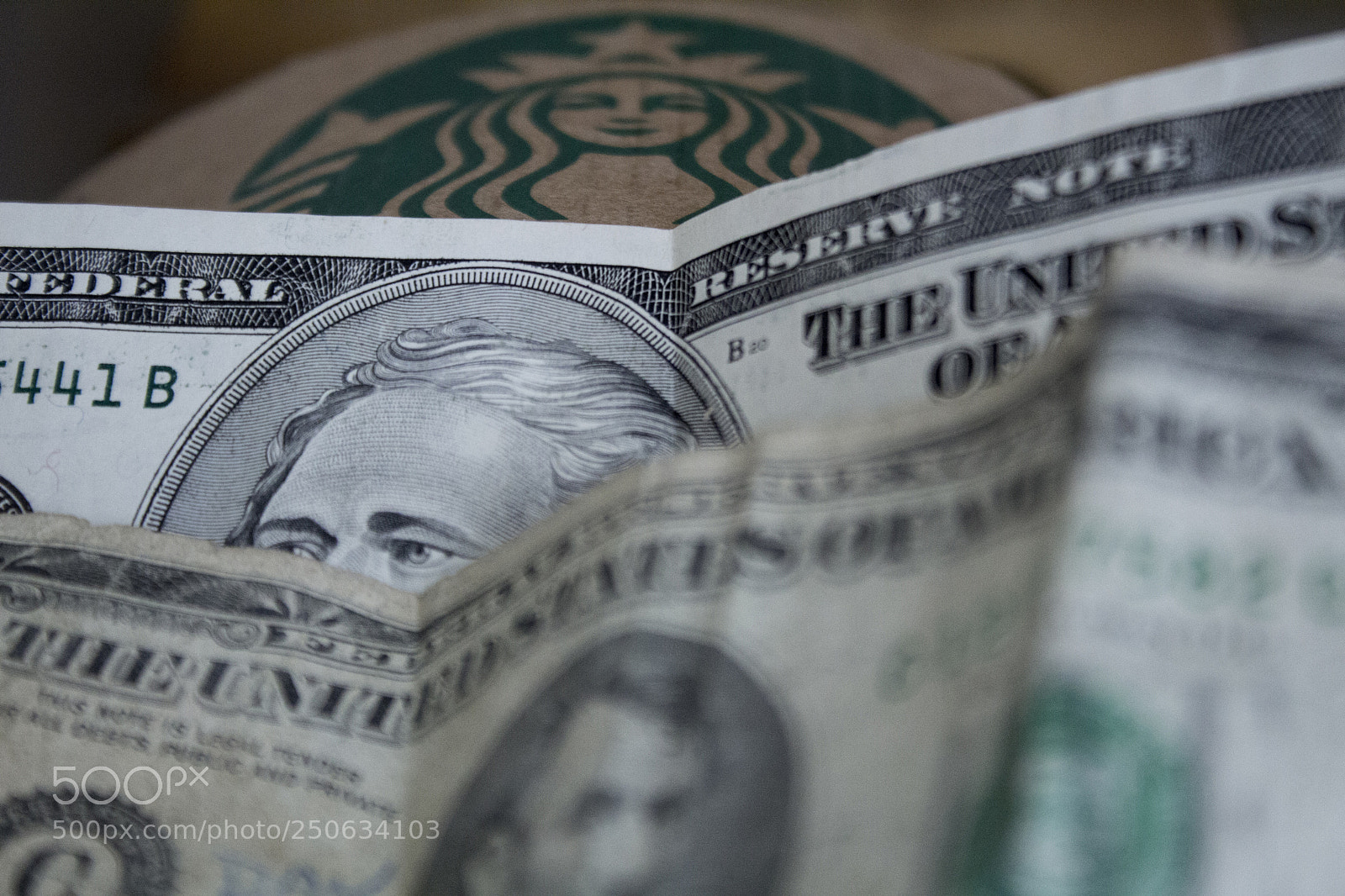 Canon EOS 1200D (EOS Rebel T5 / EOS Kiss X70 / EOS Hi) sample photo. Dollars and starbucks edited. photography
