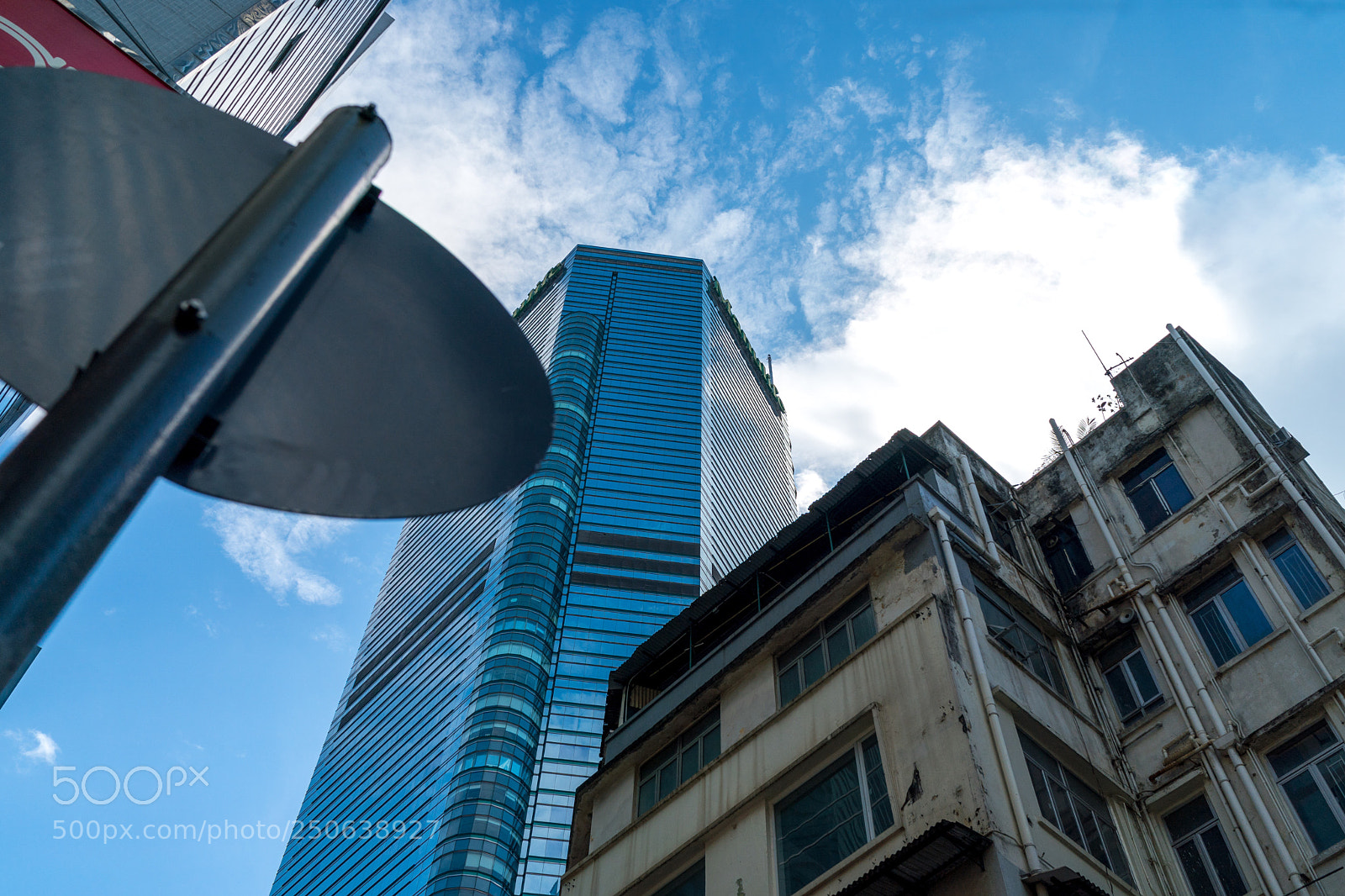 Sony a9 sample photo. Sky, brick, and glass photography
