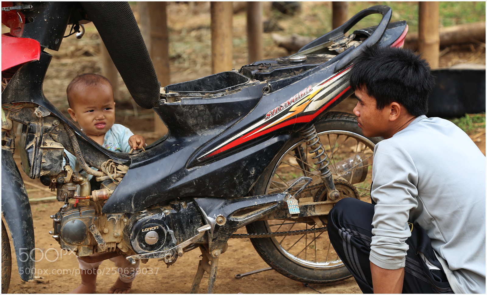 Canon EOS 6D + Canon EF 24-105mm F4L IS USM sample photo. Junior mechanic helps dad photography