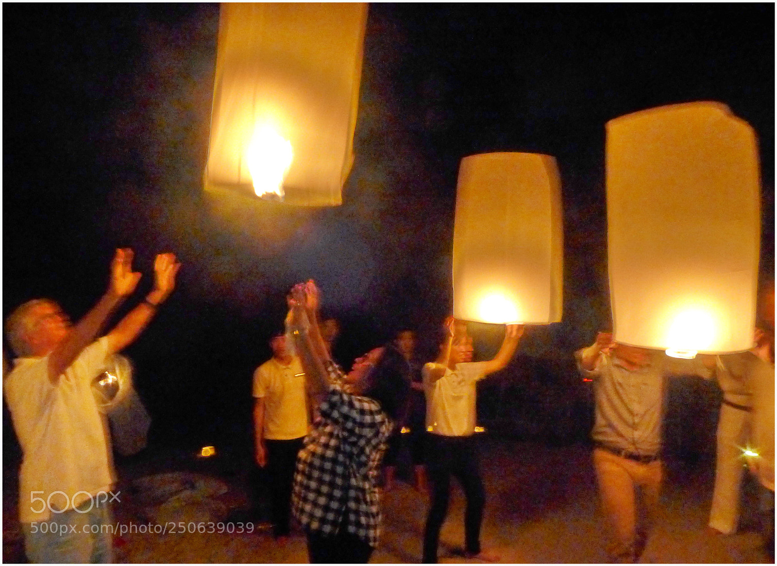 Panasonic Lumix DMC-LX7 sample photo. Letting go fire lanterns photography