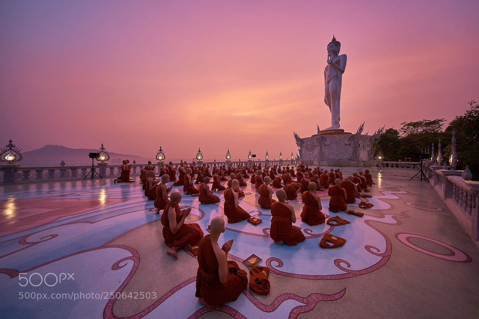 Sony a7 II sample photo. Young monk praying in photography
