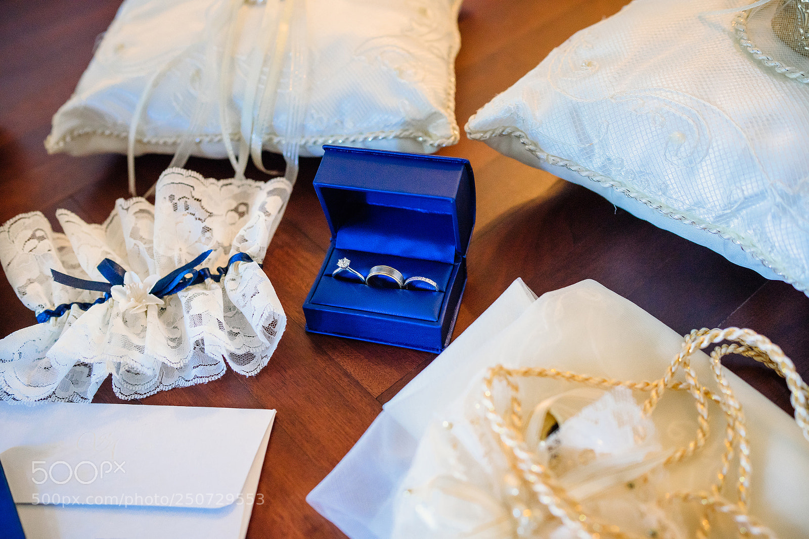Sony a7 II sample photo. Wedding rings, garter, pincushion photography