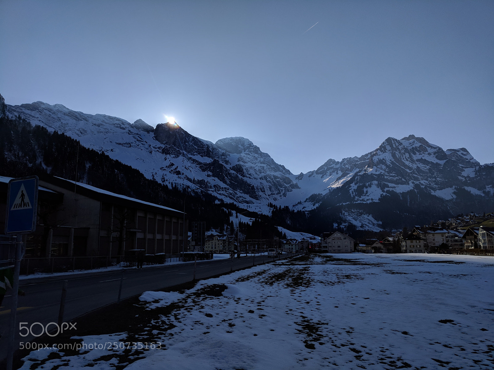 Google Pixel XL sample photo. Sun behind the alps photography