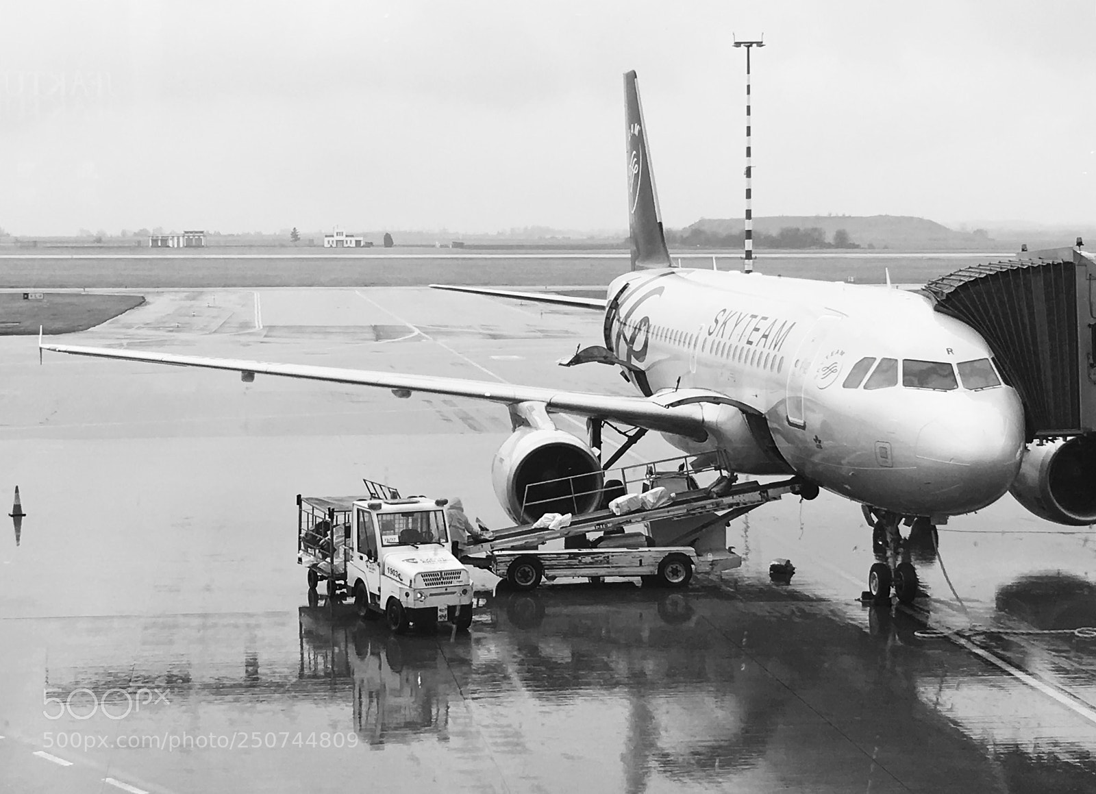 Apple iPhone 6s sample photo. Rainy in prague airport photography