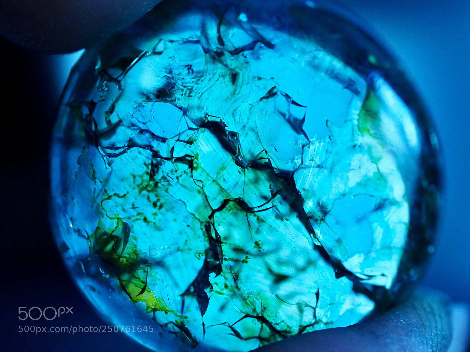 Olympus OM-D E-M1 sample photo. Fractured glass pebble..i heated photography