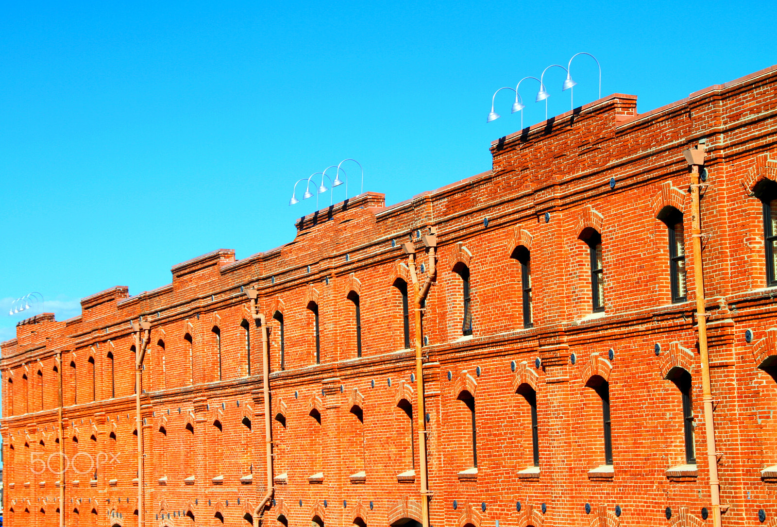 Canon EOS 7D + Sigma 18-250mm F3.5-6.3 DC OS HSM sample photo. Terracotta bricks bldg photography