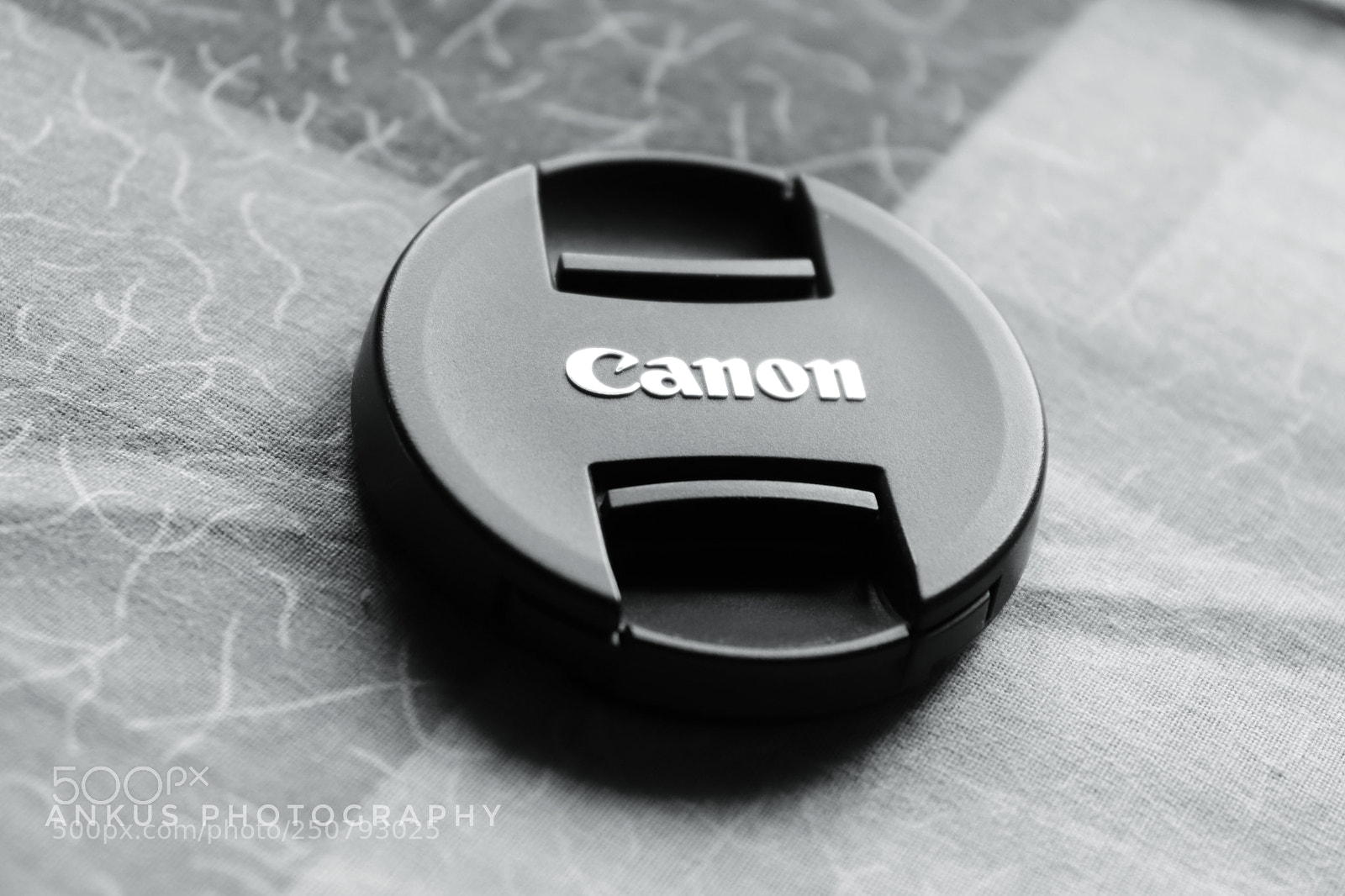 Canon EOS 200D (EOS Rebel SL2 / EOS Kiss X9) sample photo. Canon lense cap photography