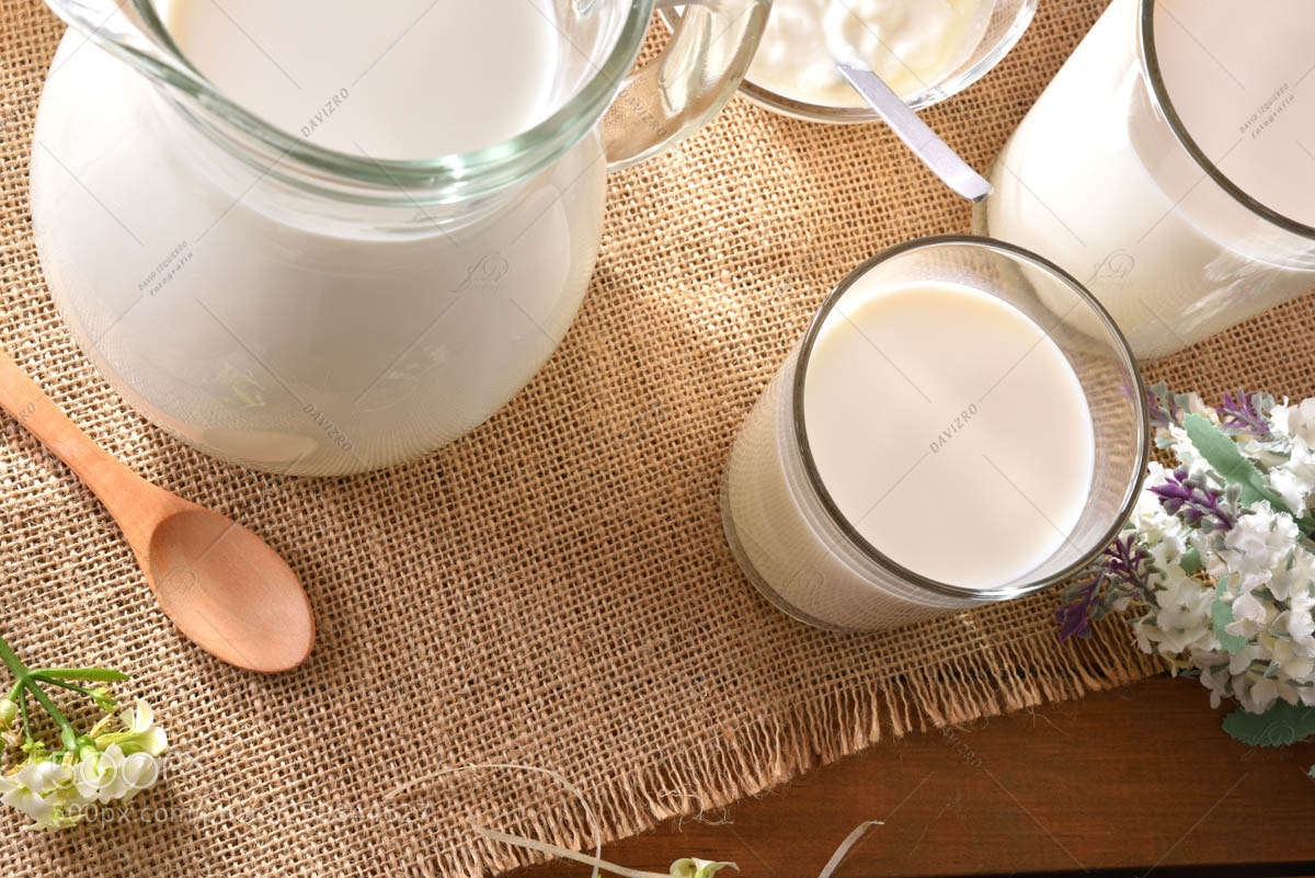 Nikon D810 sample photo. Milk containers on wooden photography