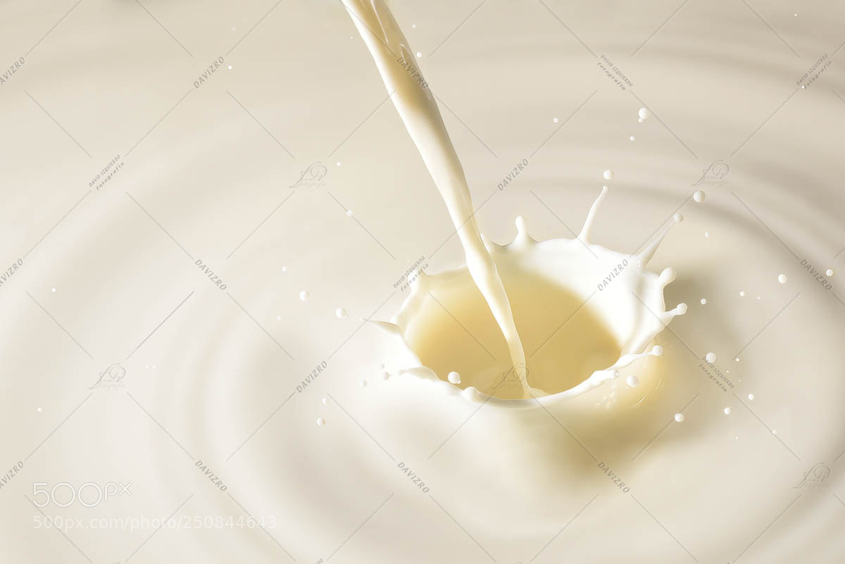 Nikon D810 sample photo. Stream of milk falling photography
