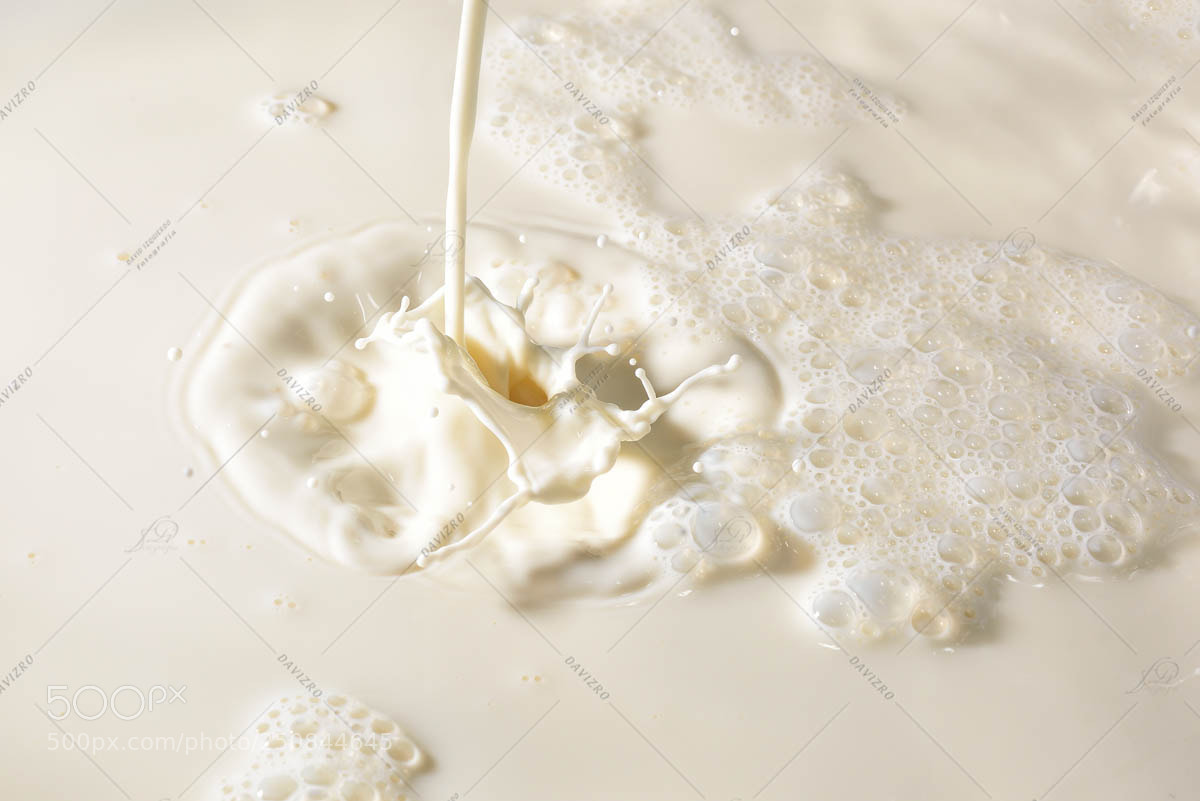 Nikon D810 sample photo. Stream of milk poured photography