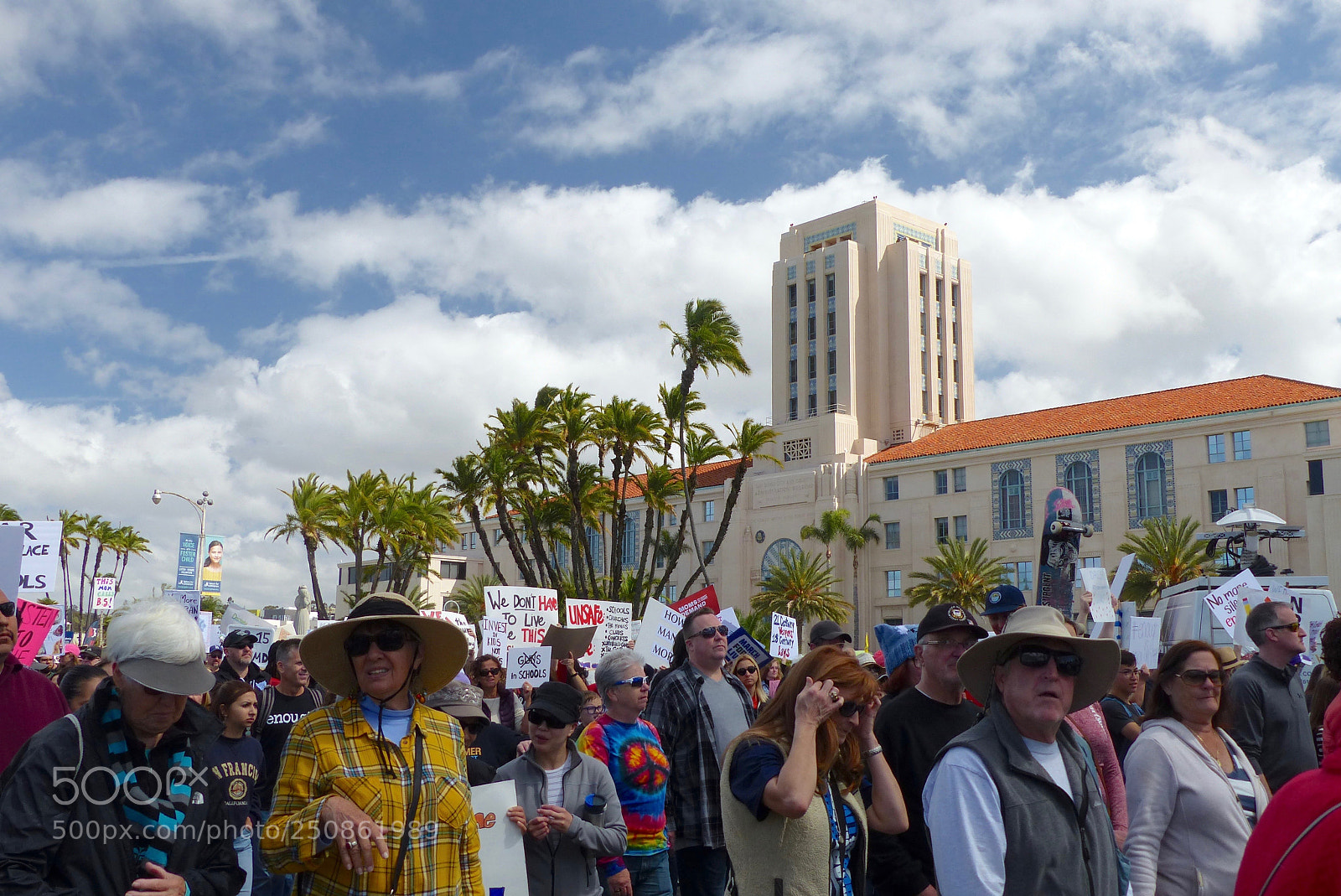 Panasonic Lumix DMC-FZ200 sample photo. Marching past county administration photography
