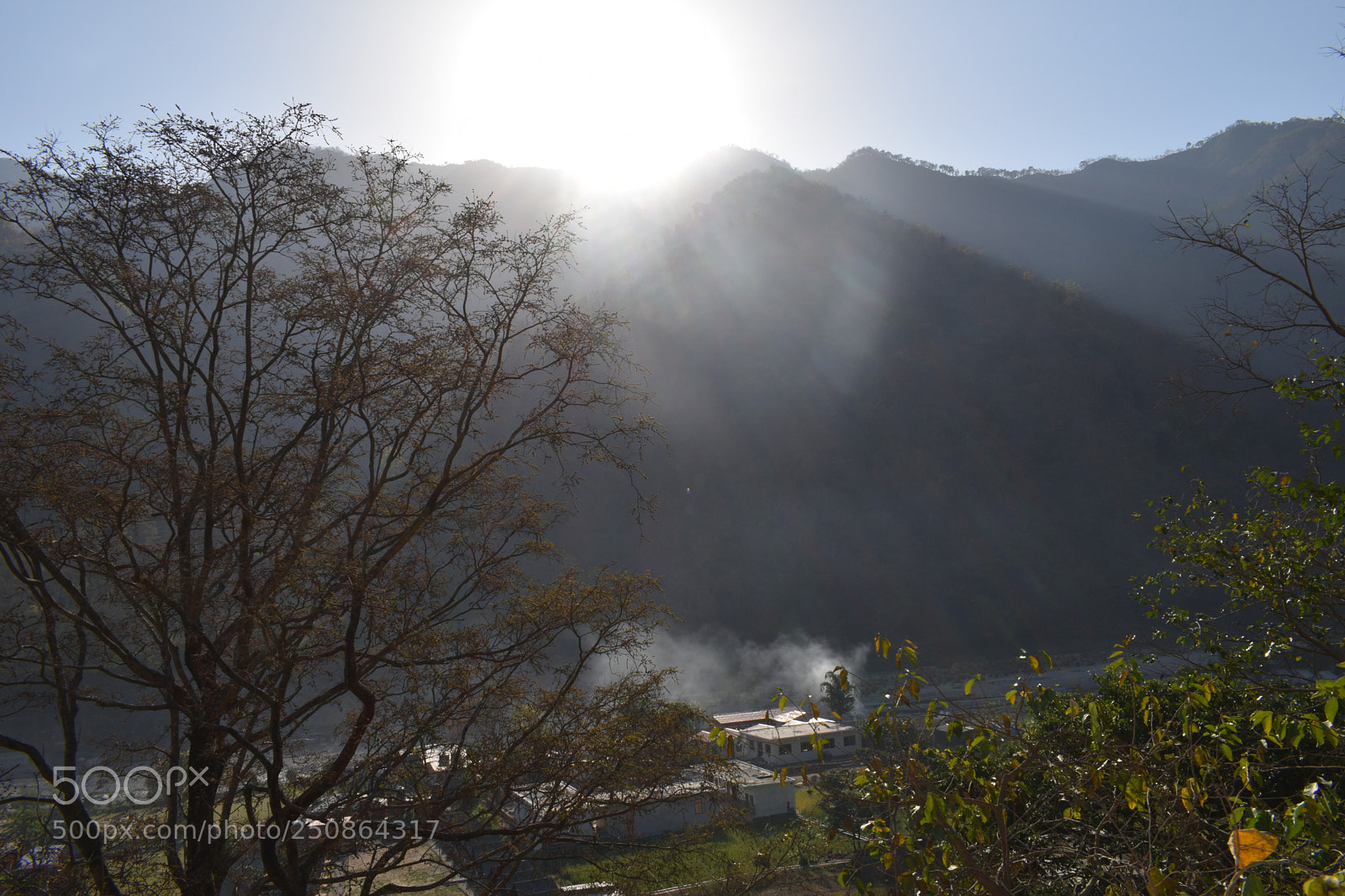 Nikon D3300 sample photo. Sun gazing through mountains photography