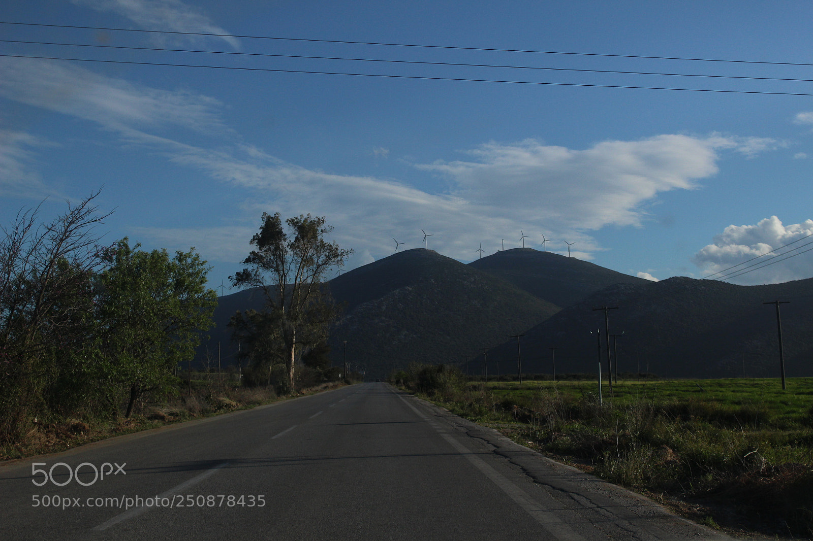 Canon EOS 100D (EOS Rebel SL1 / EOS Kiss X7) sample photo. Windmills waving back photography