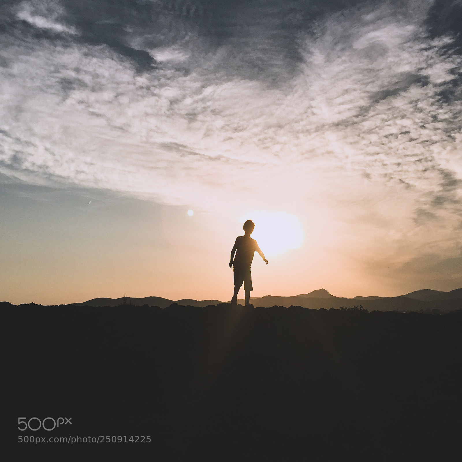 Apple iPhone 6 sample photo. Silhouette of a boy photography