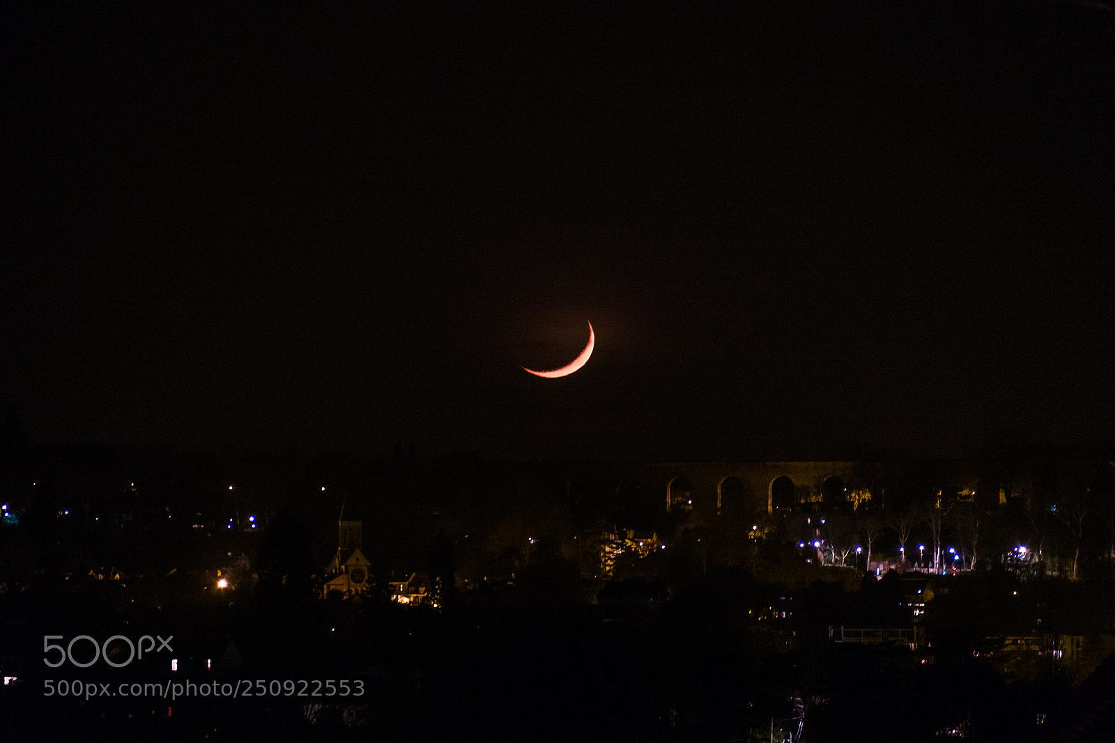 Fujifilm X-M1 sample photo. Moonset and city lights photography