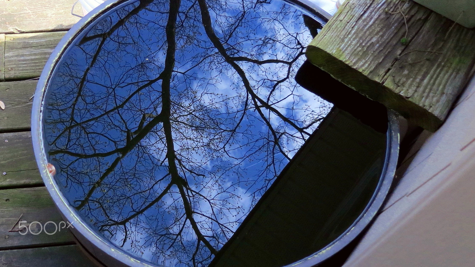 Canon PowerShot S100 sample photo. Rain barrel in early spring photography