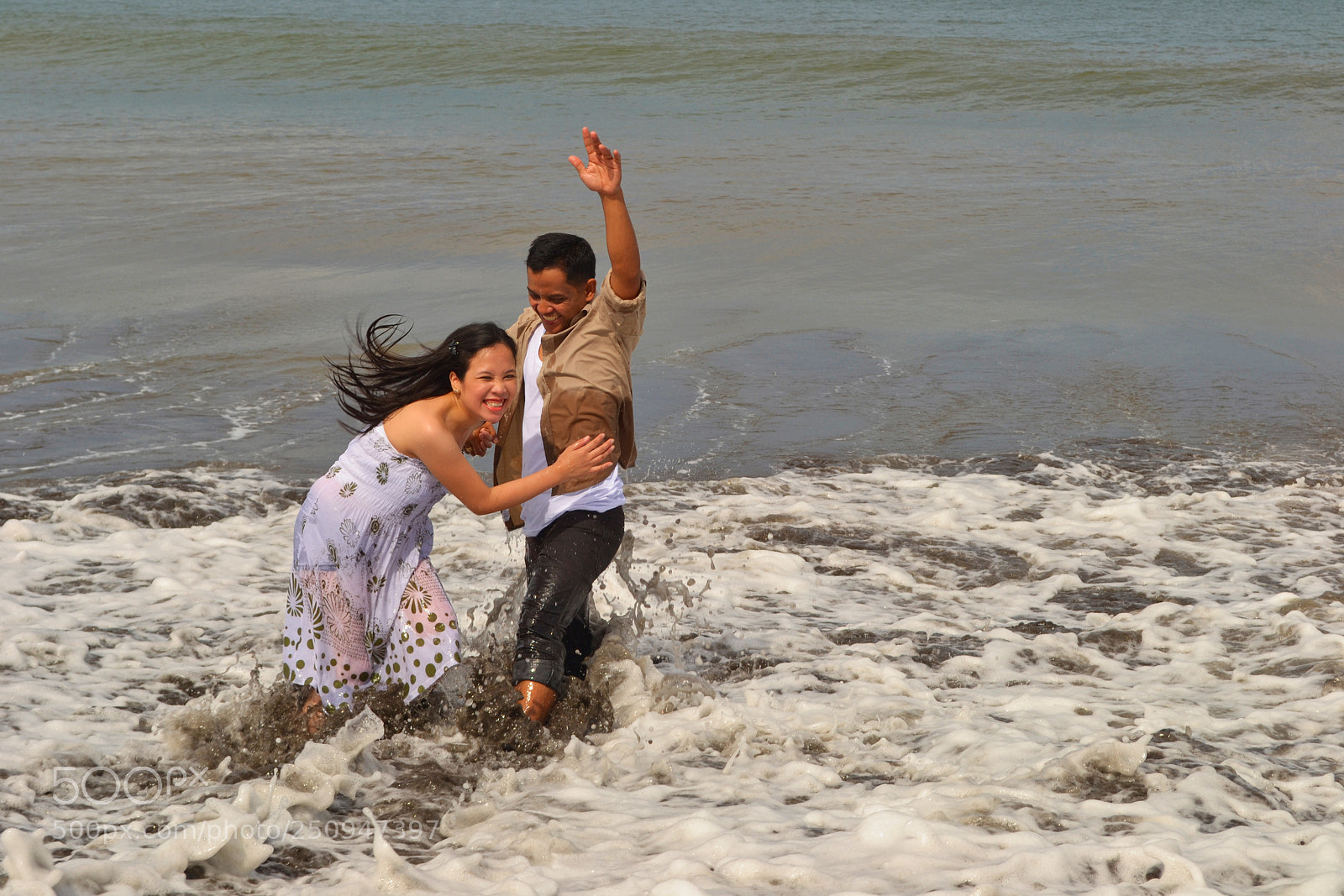 Nikon D3100 sample photo. Couple in the beach photography