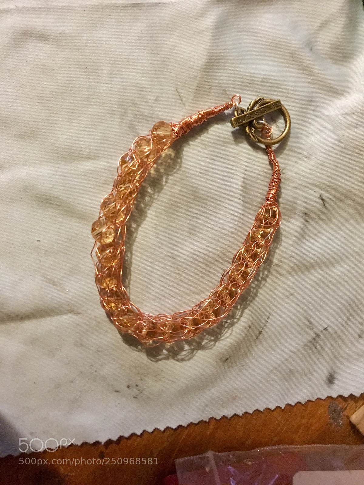 Apple iPhone SE sample photo. Wire netted bracelet with photography