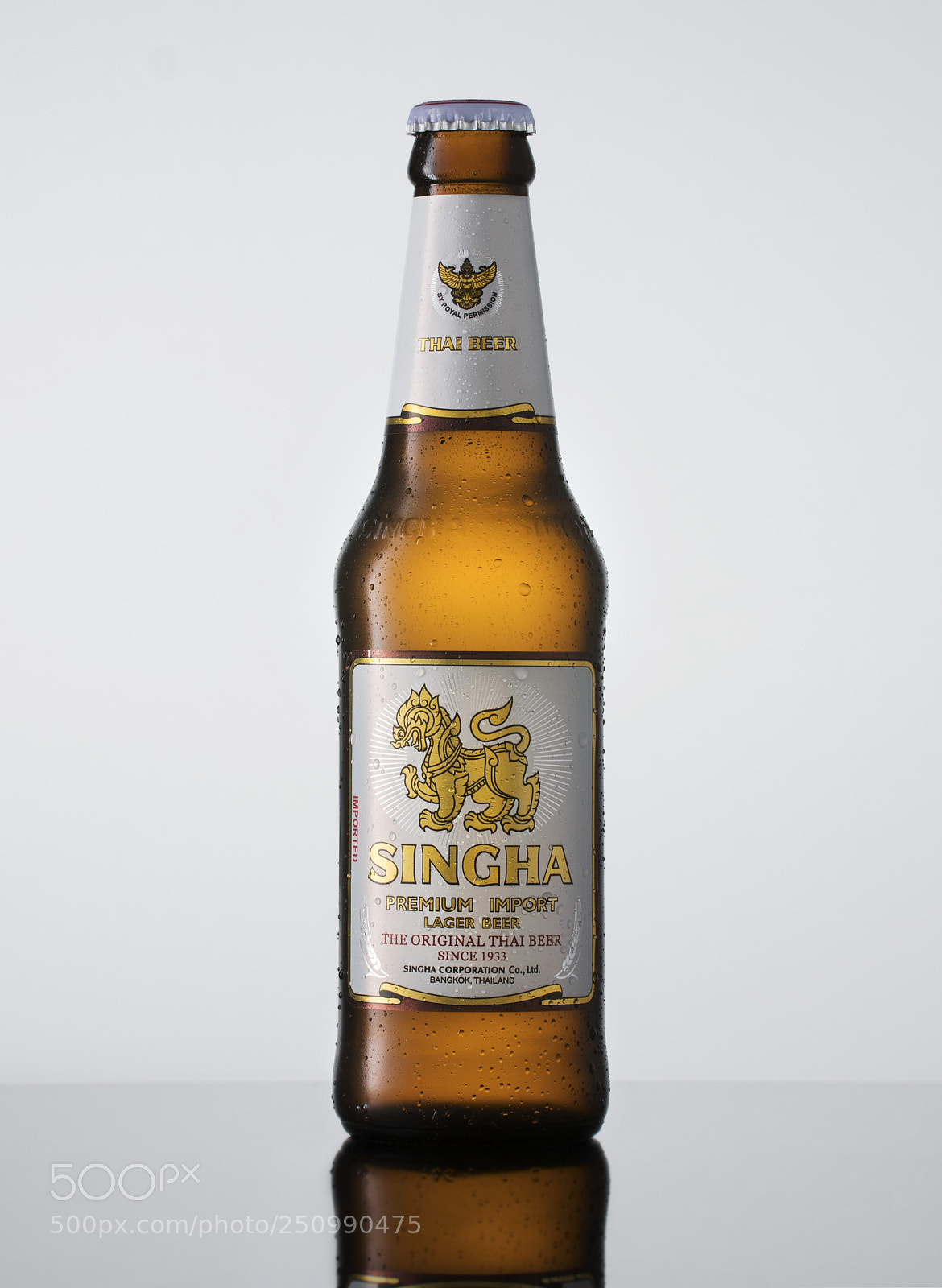 Sony a6500 sample photo. Singha beer on white photography