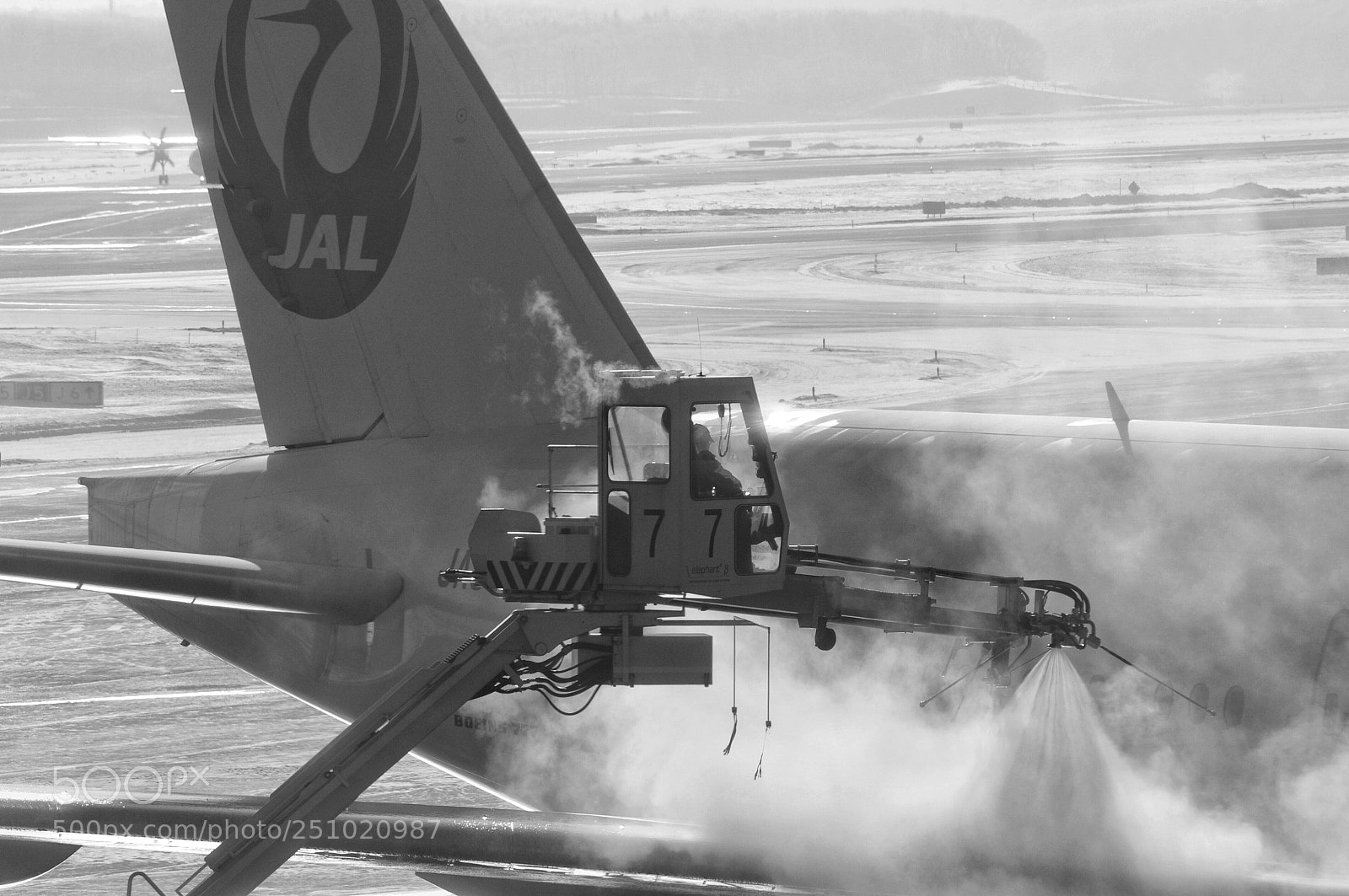 Pentax K-x sample photo. Anti-icing agent is sprinkling photography