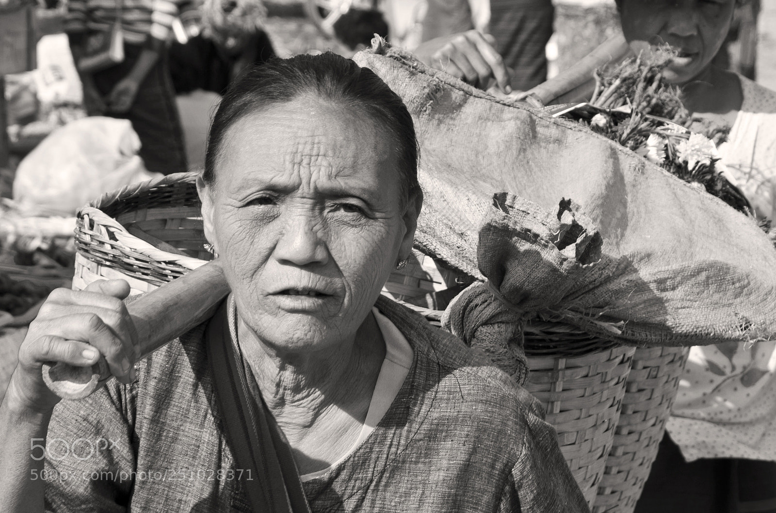 Nikon D7000 sample photo. Old woman working on photography