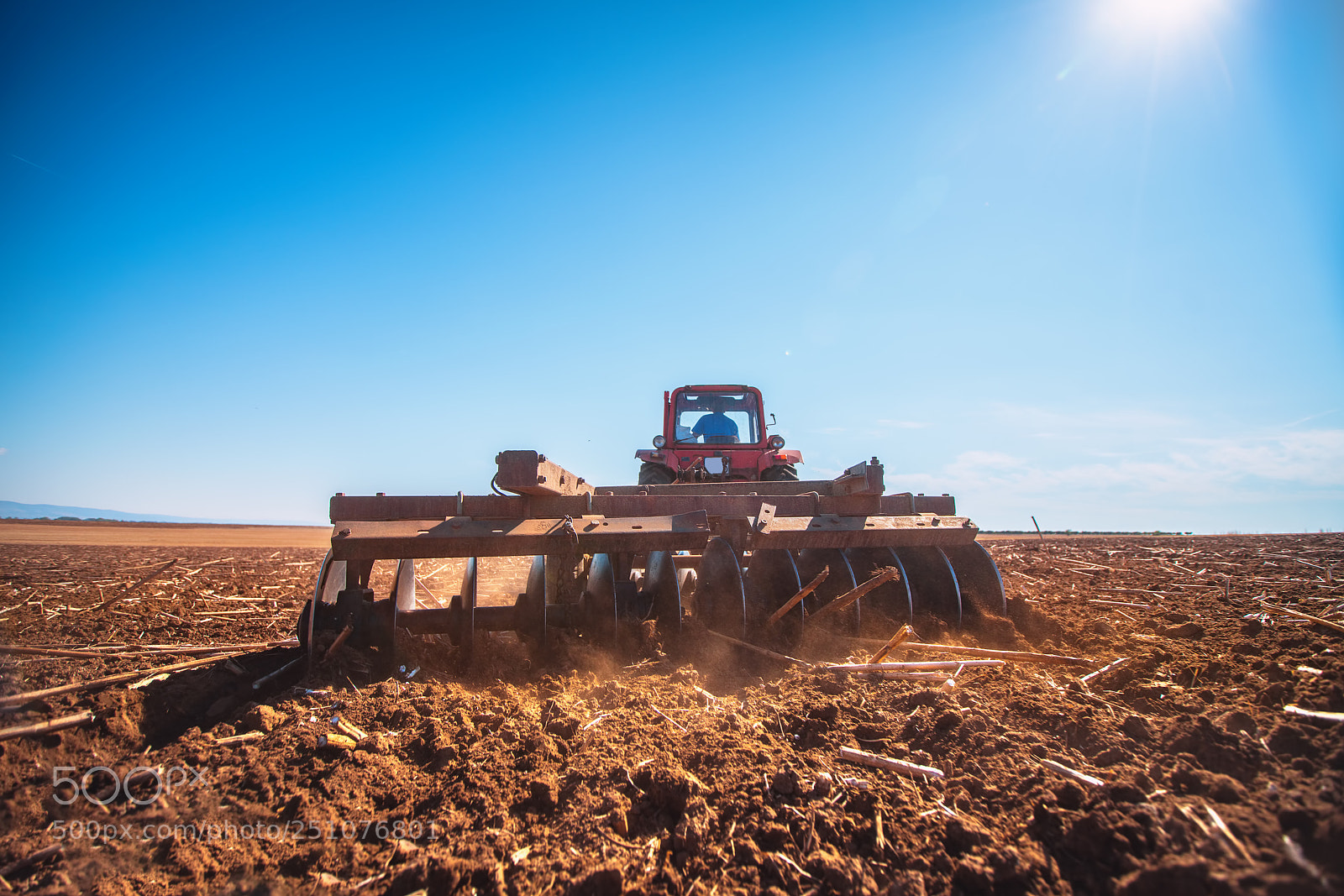Sony a7R II sample photo. Farmer in tractor preparing photography