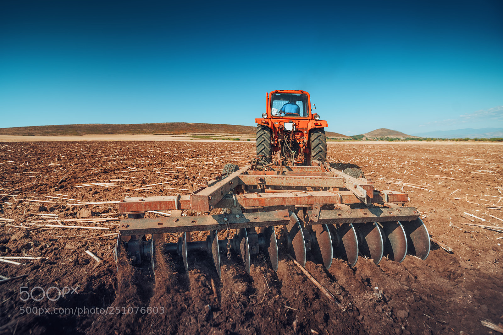 Sony a7R II sample photo. Farmer in tractor preparing photography