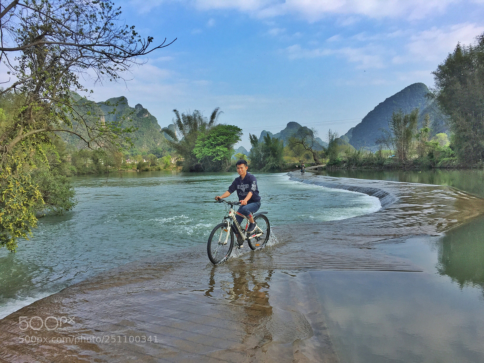 Apple iPhone 6 sample photo. Biking through the yulong photography