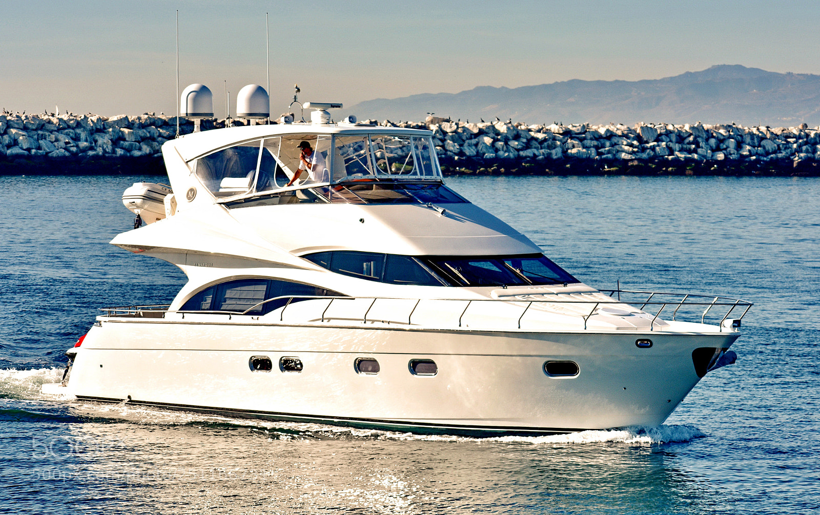 Nikon D7200 sample photo. White powerboat cruising marina photography