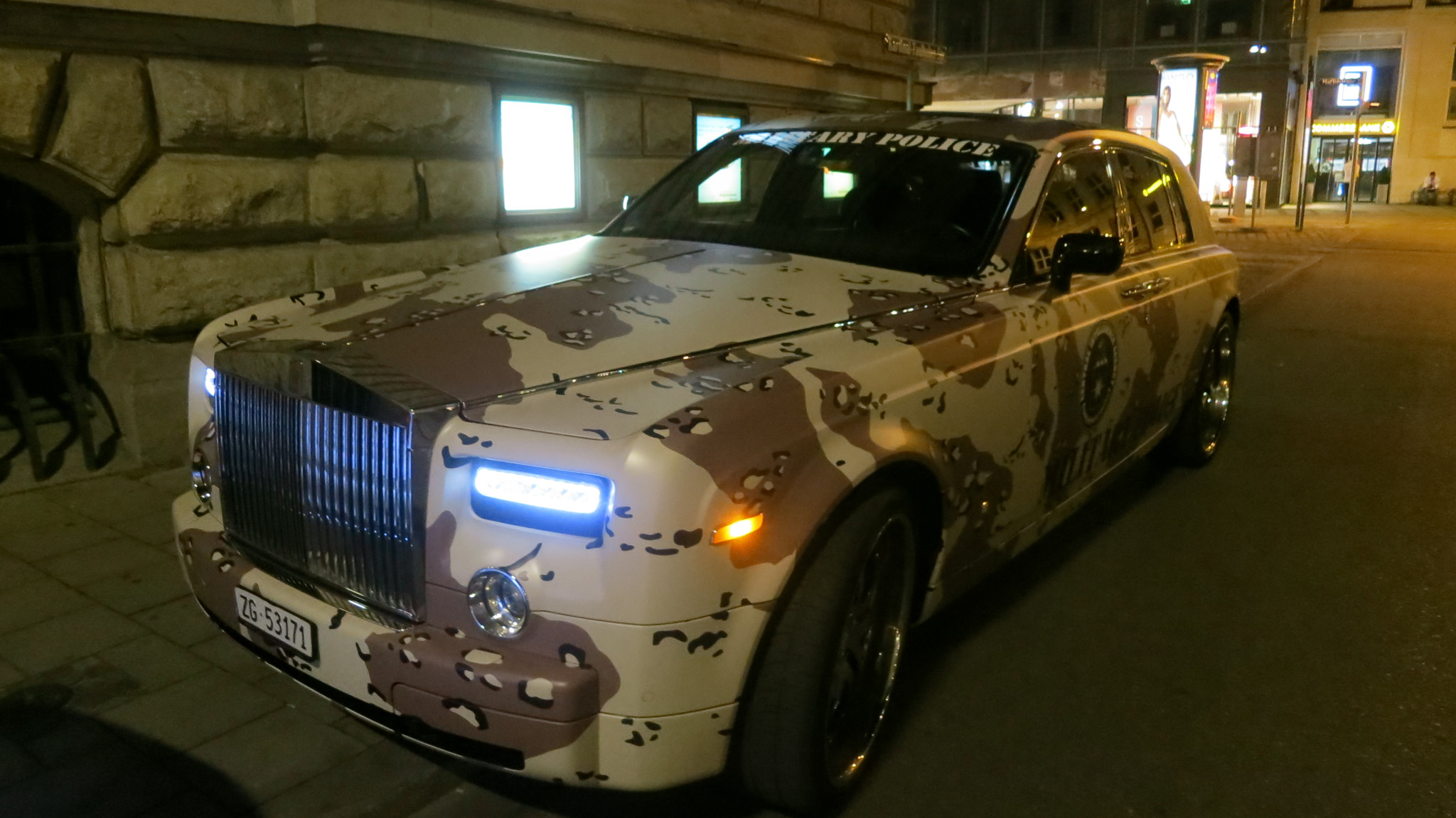 Canon PowerShot S100 sample photo. Minich at night: a rolls royce phantom vi with camouflage body painting. photography
