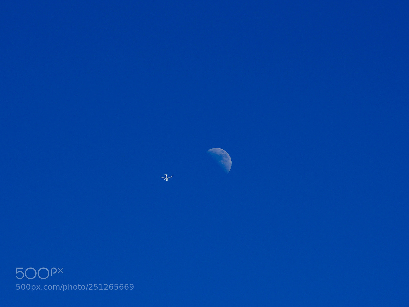 Olympus OM-D E-M10 II sample photo. Plane and moon photography