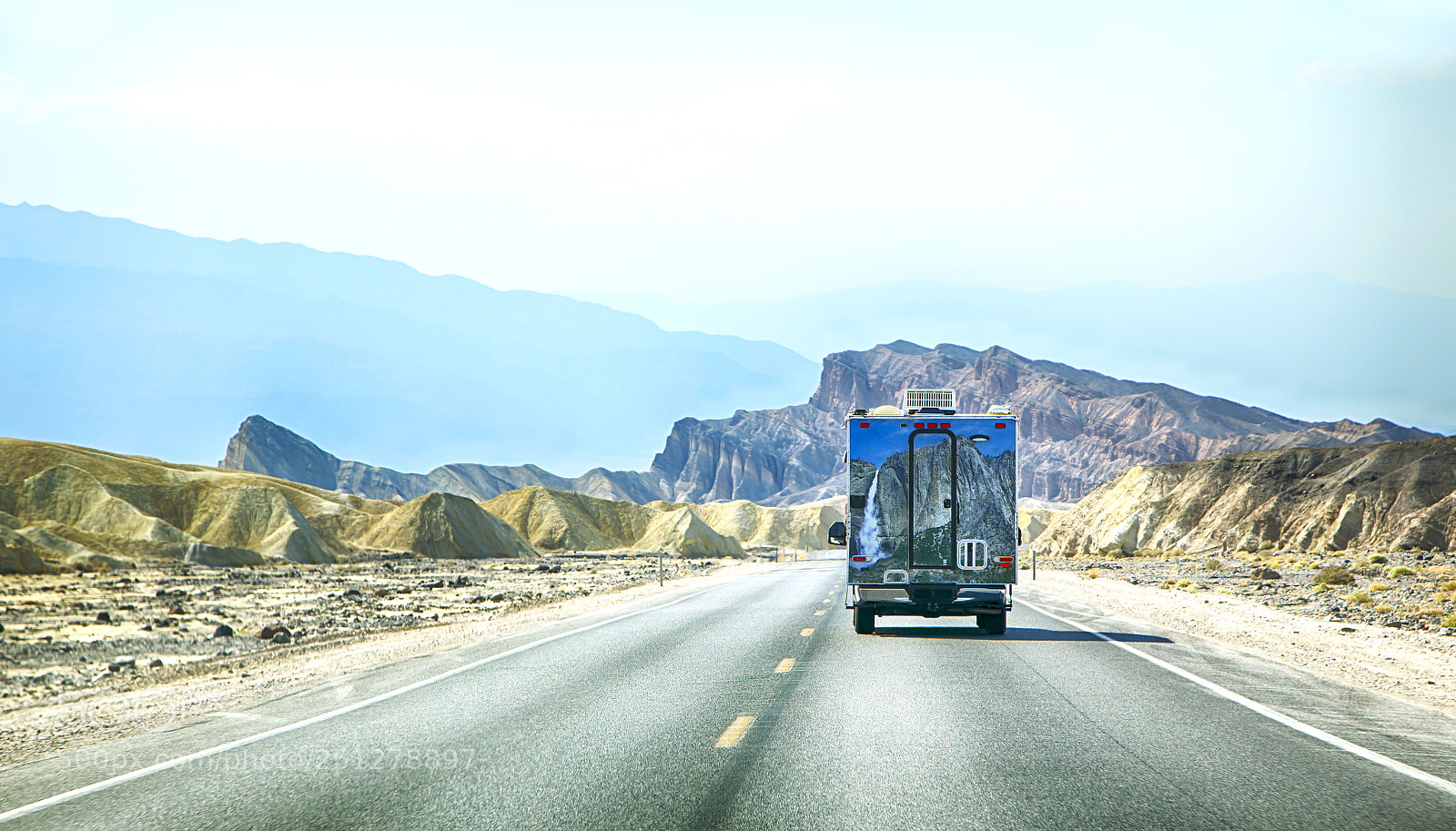 Canon EOS 5D Mark IV sample photo. Travel trailer driving through photography