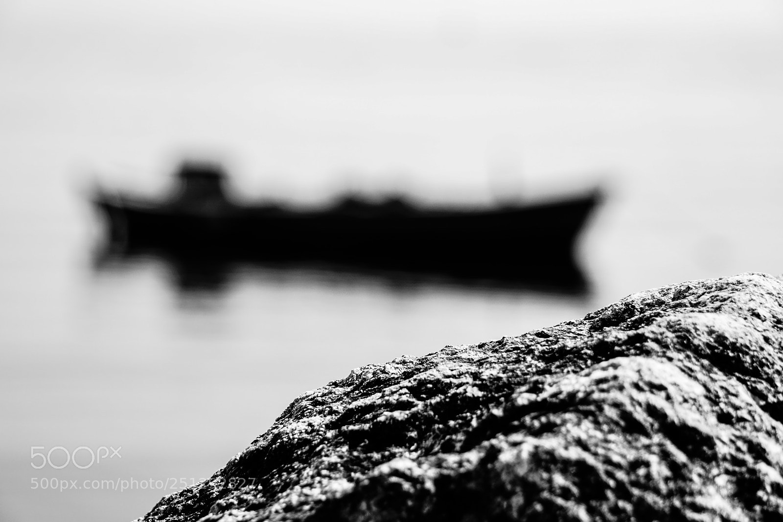 Sony a6000 sample photo. Rock and boat photography
