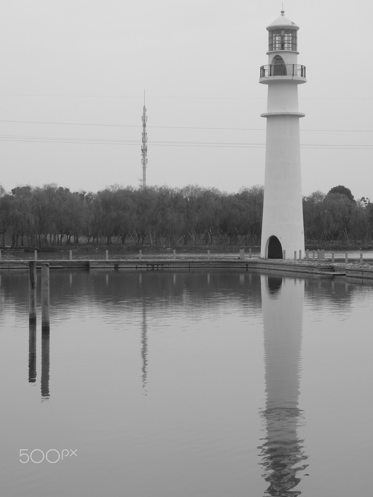 Nikon COOLPIX P900s sample photo. A lighthouse by a river photography