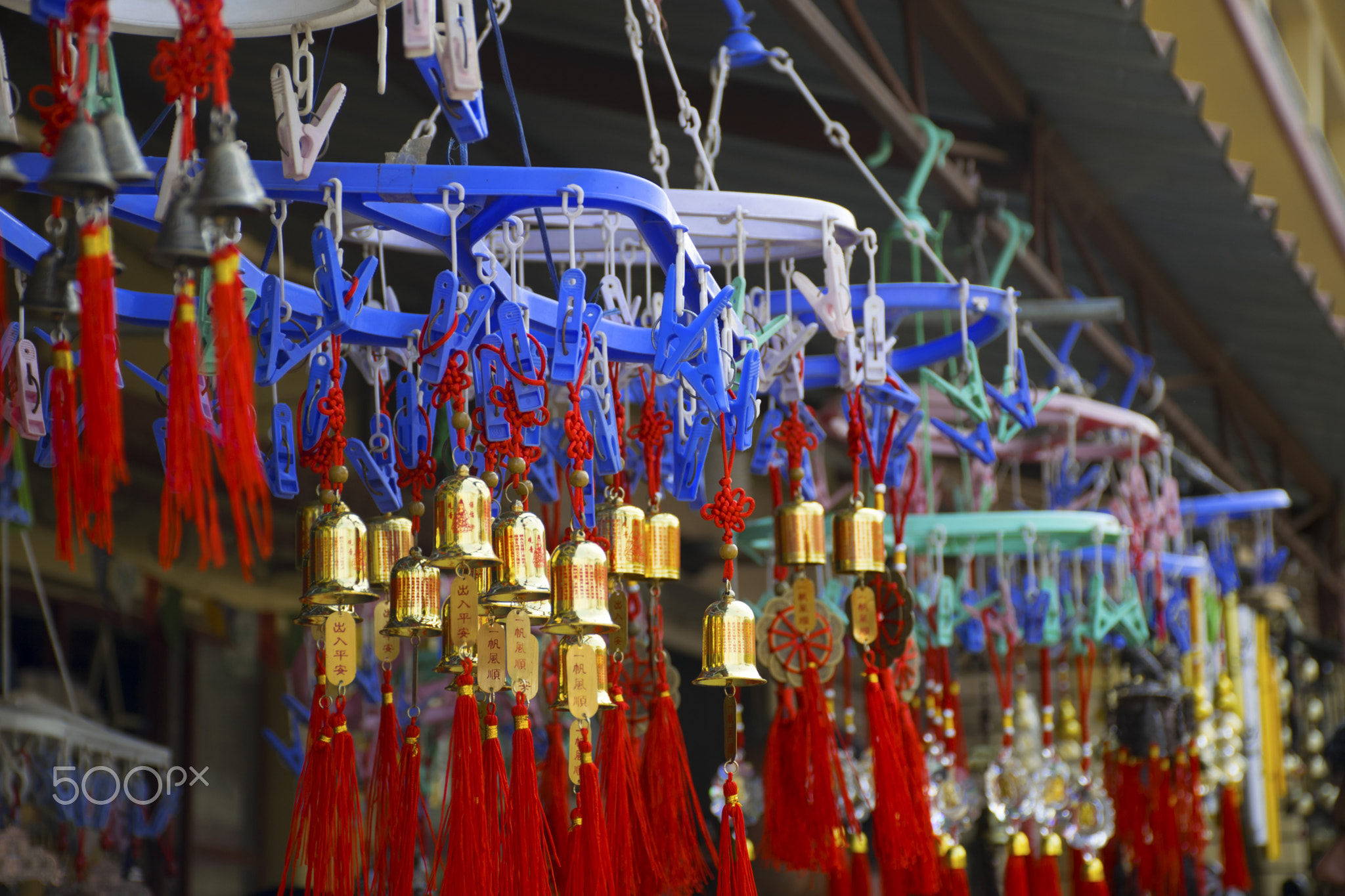 Wind chimes with writings from unknown language (non-english) on