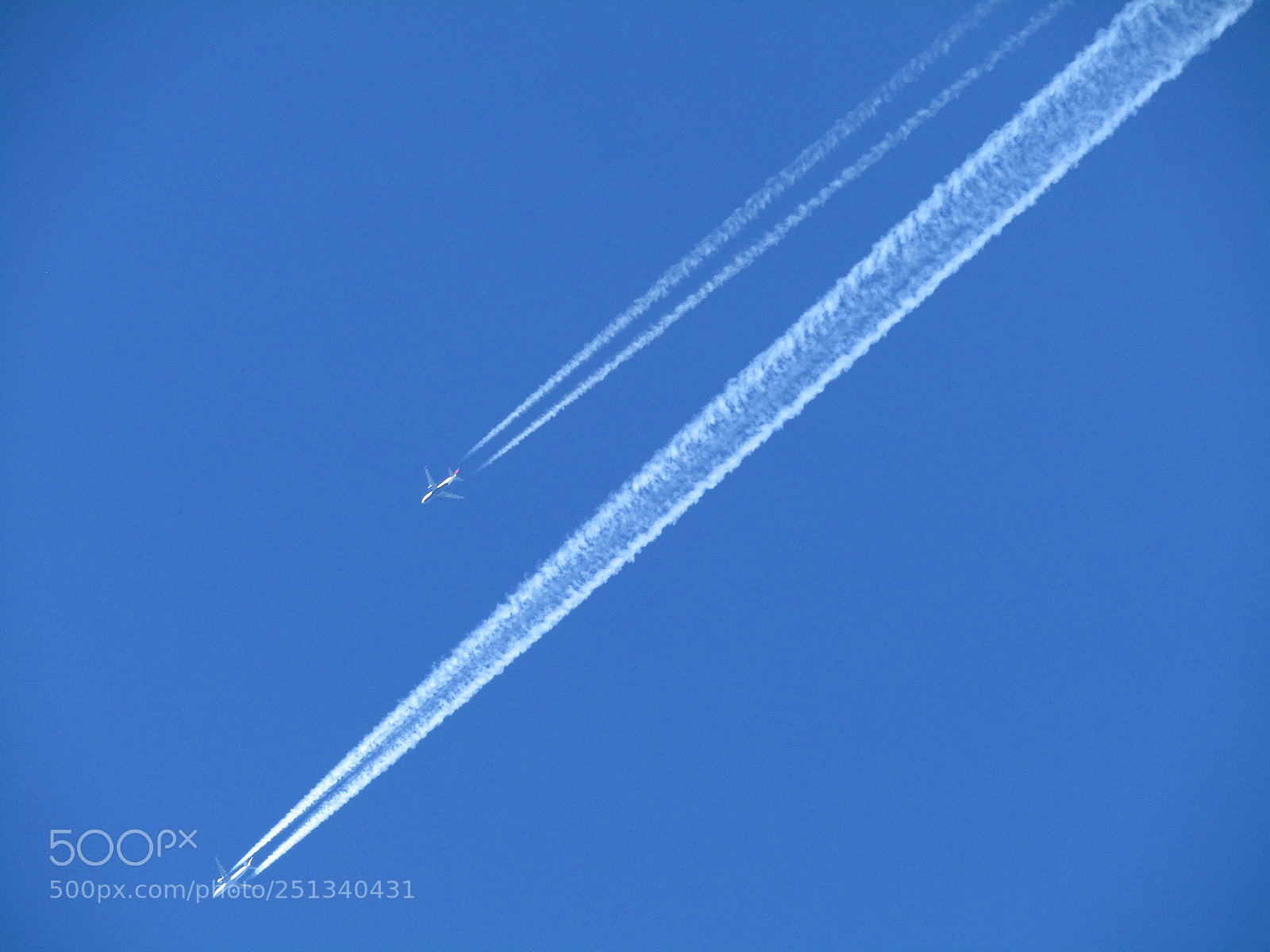 Canon PowerShot SX410 IS sample photo. Two planes, two vapour photography
