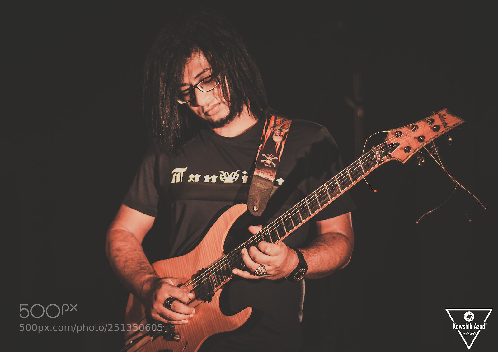 Canon EOS 70D sample photo. Ratul on guitar for photography