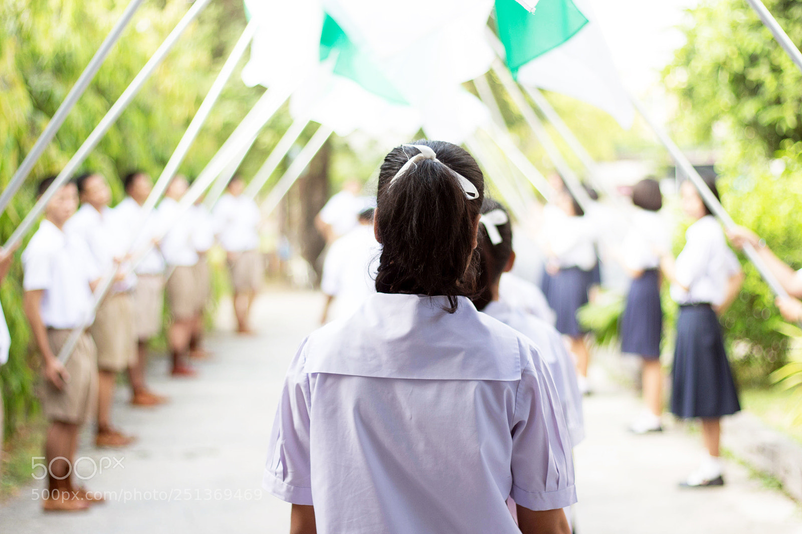 Canon EOS 700D (EOS Rebel T5i / EOS Kiss X7i) sample photo. Students pass the flag photography