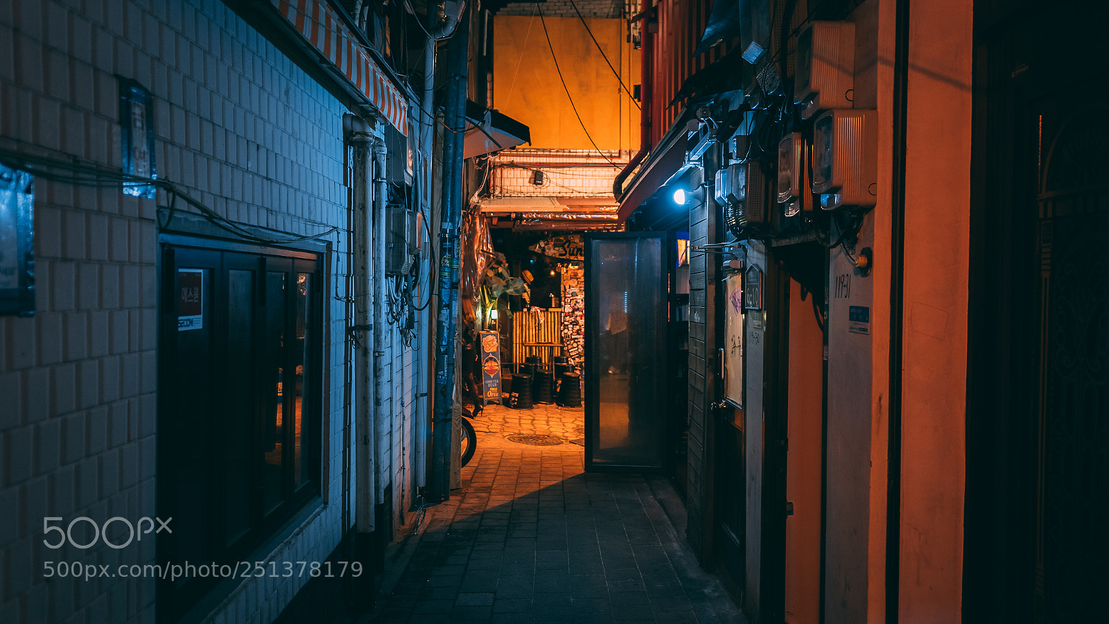 Sony a6300 sample photo. An alley with blue photography