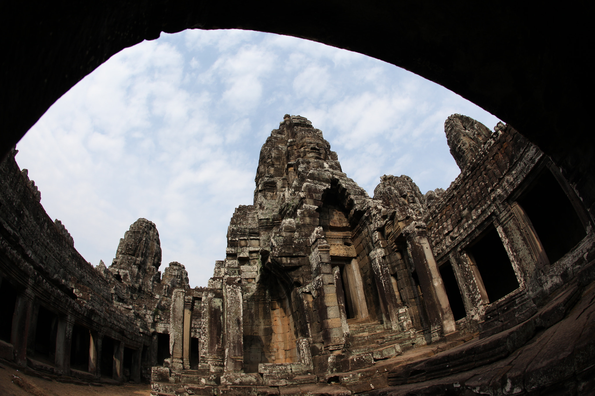Canon EF 15mm F2.8 Fisheye sample photo. Angkor wat's ruins (framed with arch) photography