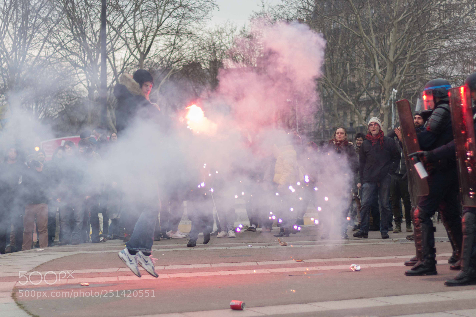Canon EOS 700D (EOS Rebel T5i / EOS Kiss X7i) sample photo. Police men thowing gas photography
