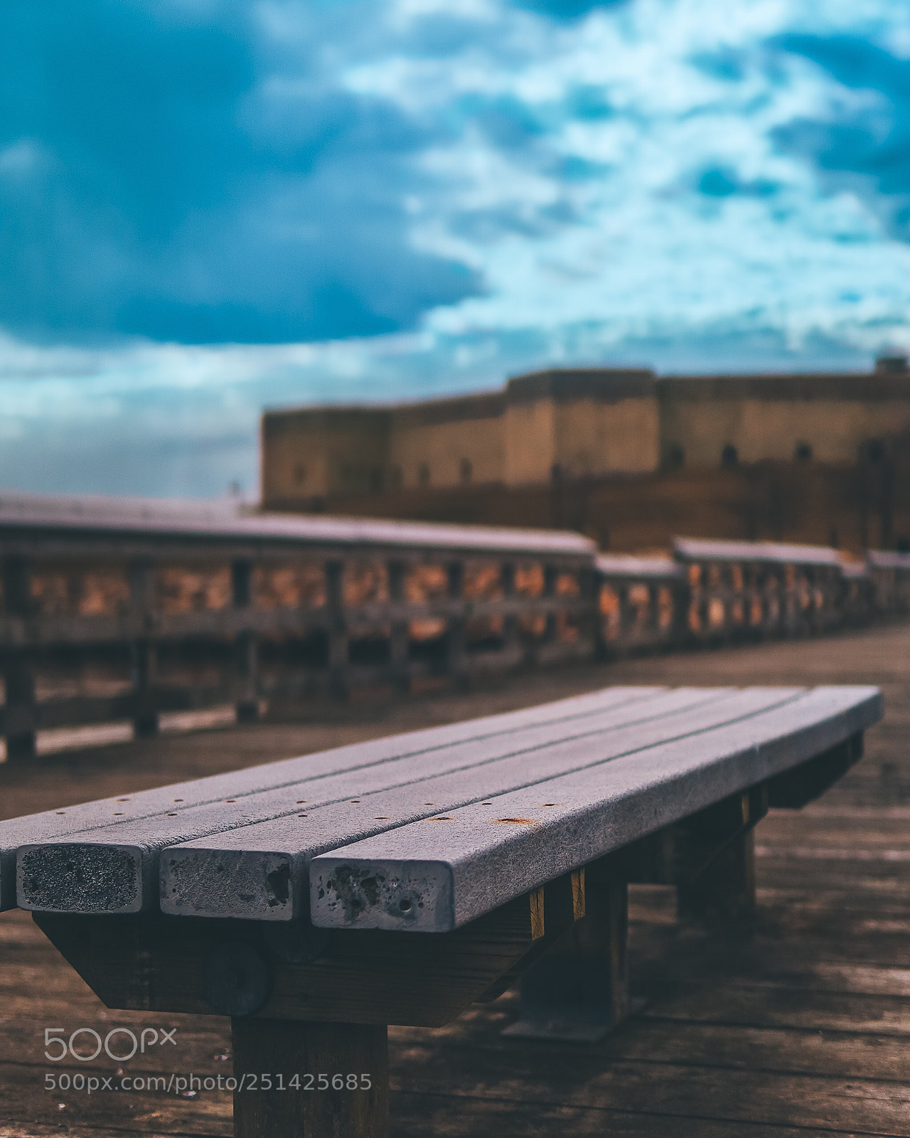 Sony a6000 sample photo. Bench along the walkway photography