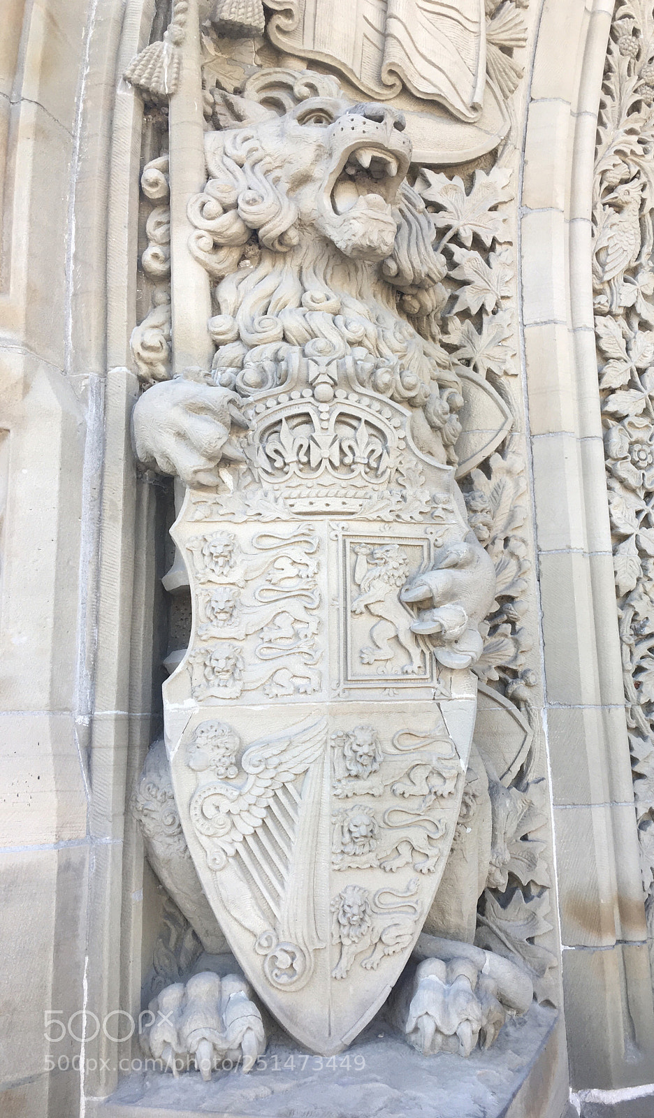 Apple iPhone 6s Plus sample photo. Gargoyle at the entrance photography