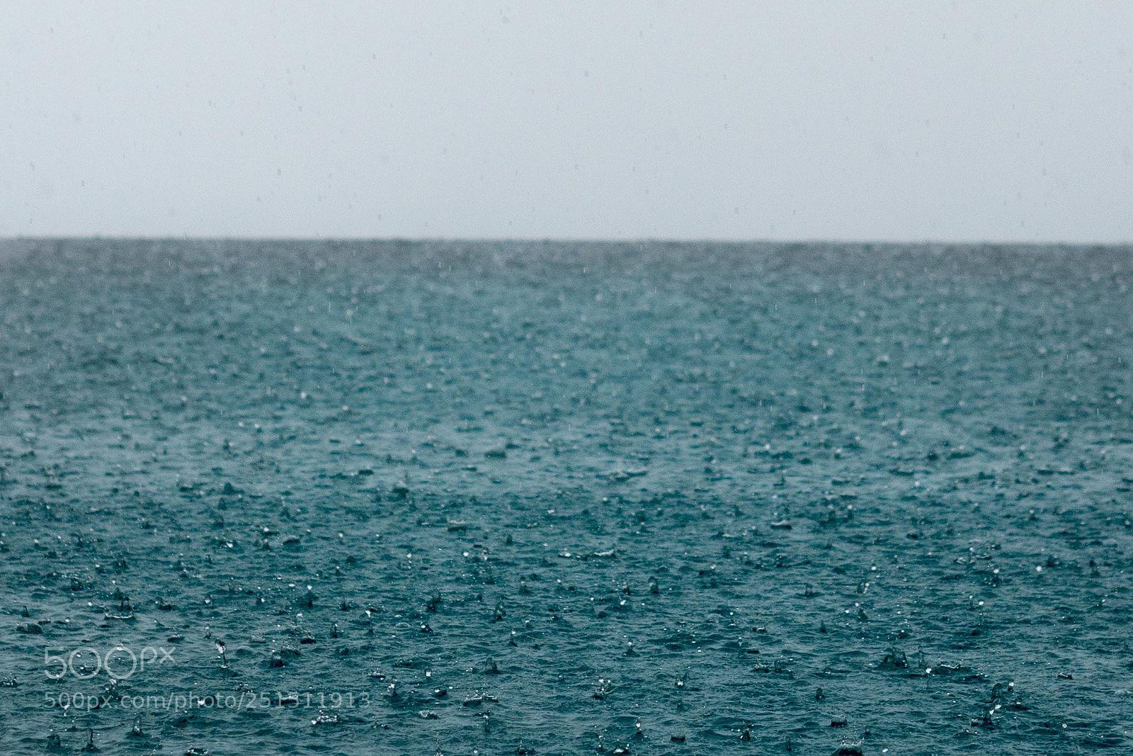 Panasonic Lumix DMC-GH4 sample photo. Rain on water photography